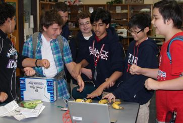 Shackelford students interact with technology during makerspace in the library
