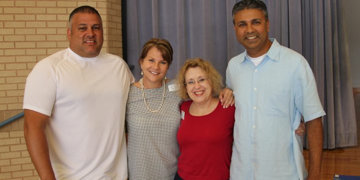 Former Ferguson principals pose for a photo together