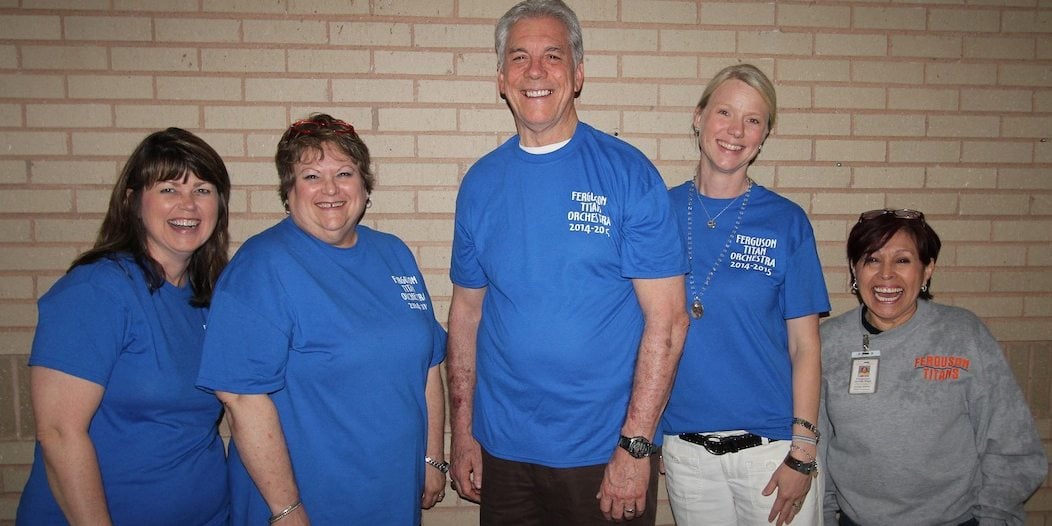 Original Ferguson staff pose for a photo together