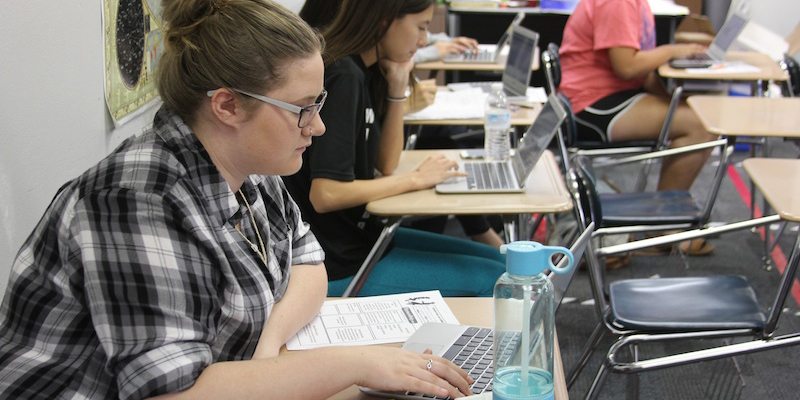 Martin student uses Chromebook in work geography class