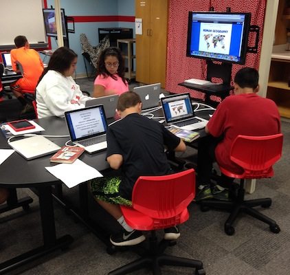 Moore students working in the collaboration lab