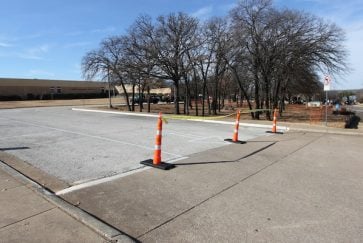 Site work about to begin at Sherrod - cones up in the driveway