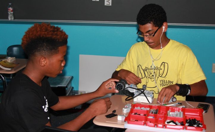 Students work with Lego robotics