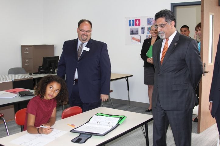 UTA's president visiting a Mandarin class at Corey Academy