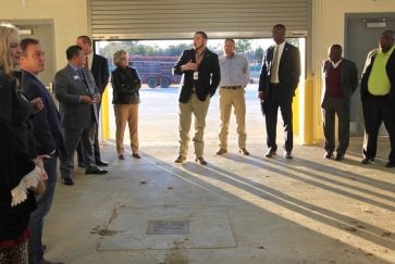 CBOC members receiving a tour of the Agricultural Center