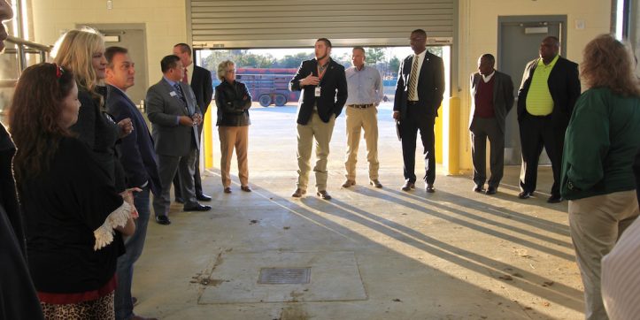 CBOC members receiving a tour of the Agricultural Center