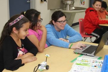 STEM teacher, Karissa Johnston, with two students in the Pearcy STEM labs