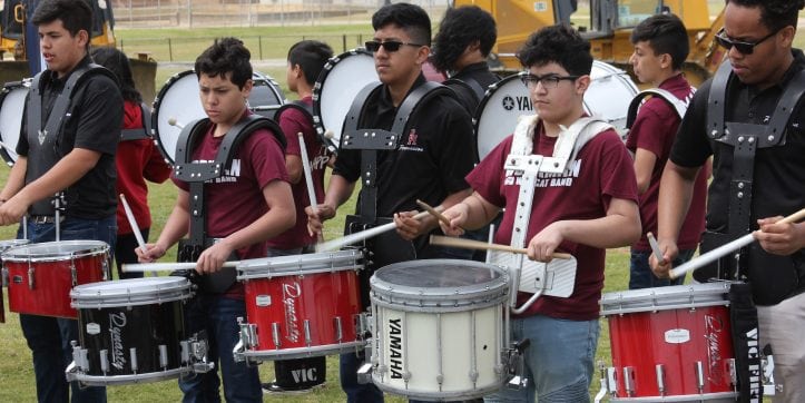 Workman Junior High's drumline performs at the ceremony announcing a new track and field for Workman