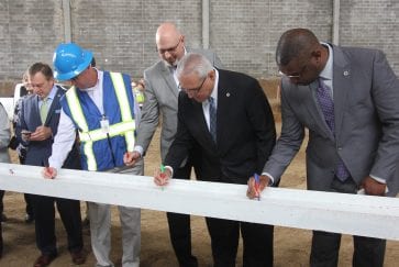 AISD leaders sign final beam at topping out ceremony for future AISD Fine Arts Center and Athletics Complex