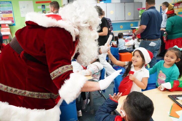 Arlington Sunrise Rotary gives stockings and toys to students