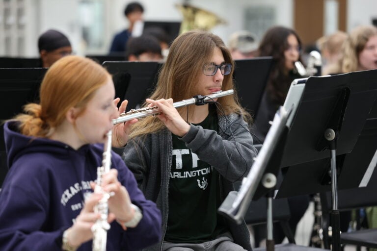 Arlington High School fine arts student playing the flute