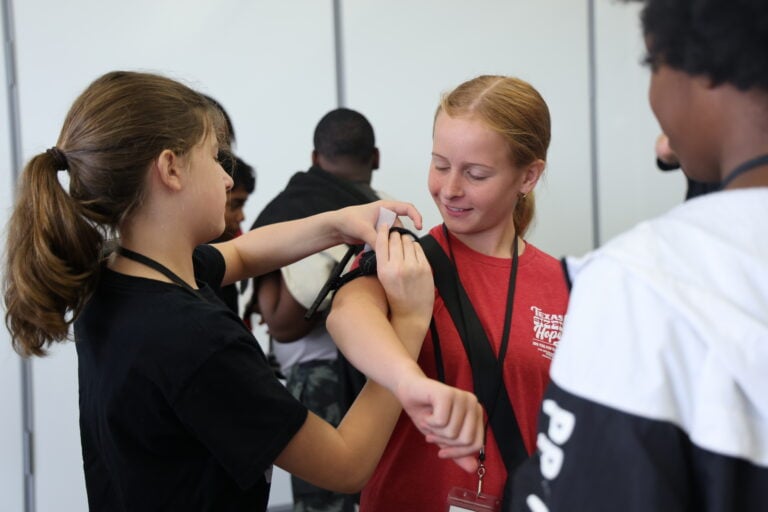 Student learn how to use tourniquets.