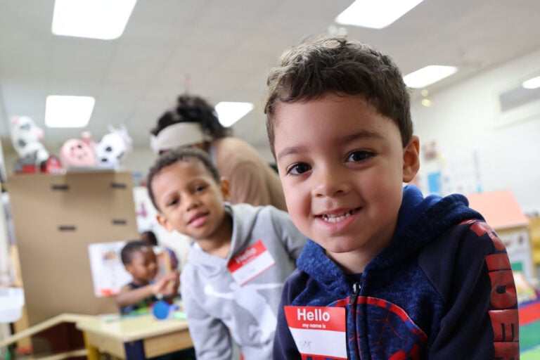 Pre-k 3 student smiling at the camera