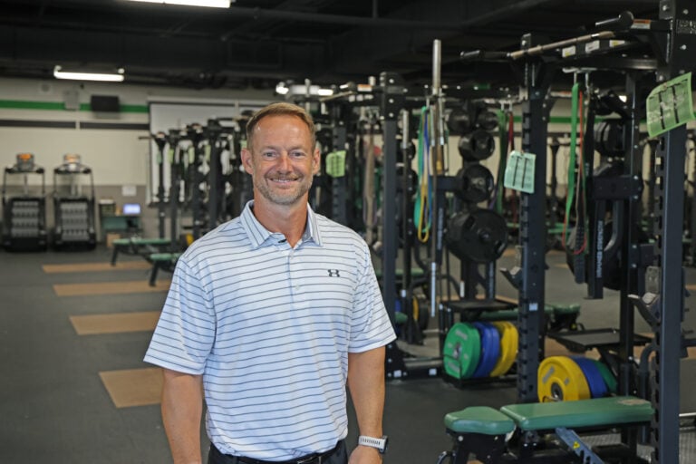 Arlington High coach balances teaching, coaching, and competing on the world stage