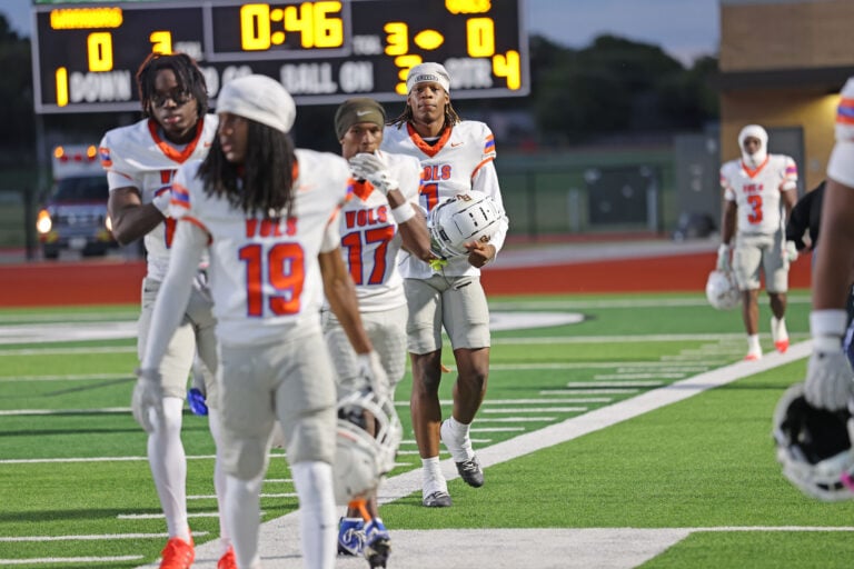 Kaleb Phifer, Bowie Football senior walking towards camera during football game
