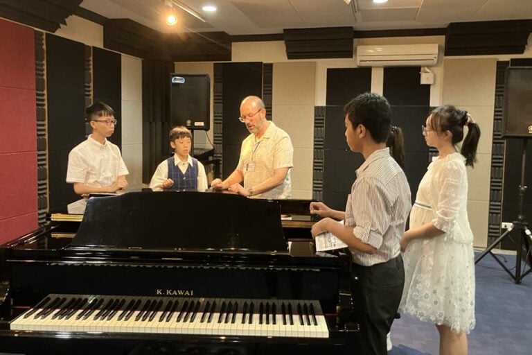 Piano teacher brings international experience back to Arlington ISD