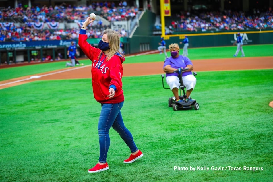 Dunn Elementary teacher throws first pitch at Texas Rangers opening day