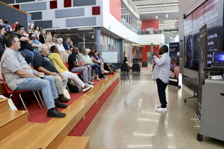Antong Lucky, former gang member, speaks to teachers at Empowered Conference