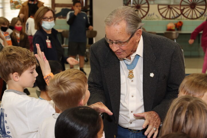 Medal of Honor winner Patrick Brady visits with students