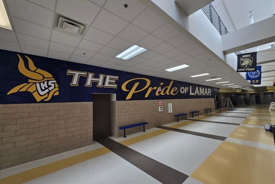 Pride of Lamar mural at Lamar High School outside the Viking band hall