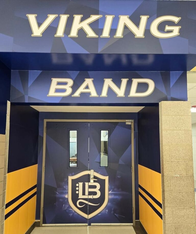 Pride of Lamar mural at Lamar High School outside the Viking band hall