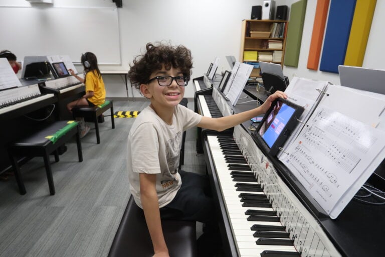 Fine arts academy student playing piano