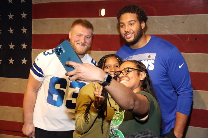 Dallas Cowboys players share the playbook for character and mental health with Nichols Junior High students