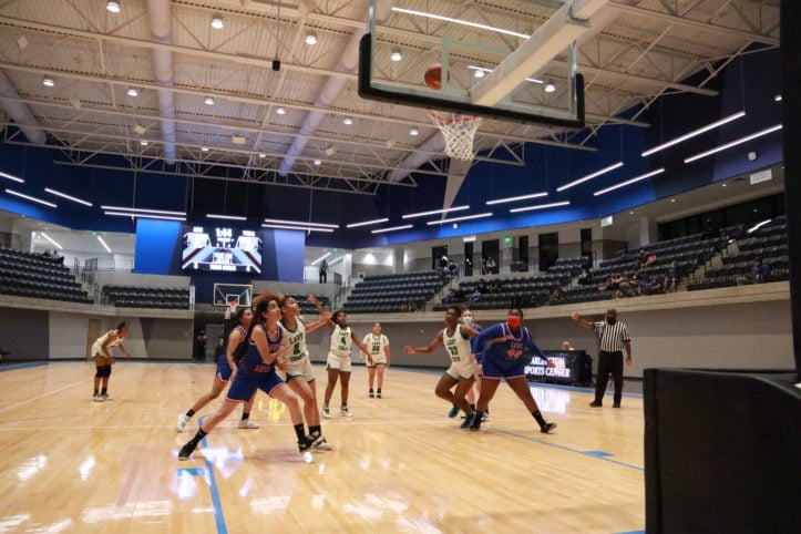 Arlington High School girls basketball team competes in first game at the new Arlington ISD Athletics Complex