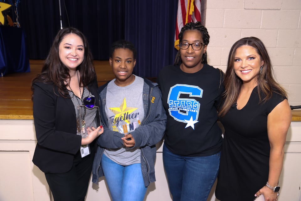 CBS 11 Brooke Katz presents Crystal Apple Award to teacher Sarah Buksa
