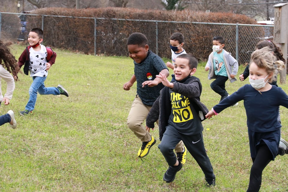 Pre-K students run at Kooken