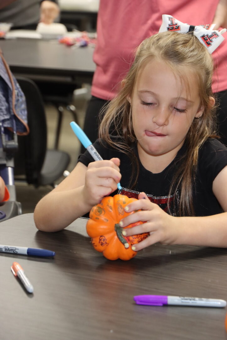 Fall festival - decorating pumpkins