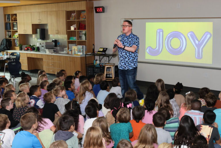 Duff Elementary's new library is visited by author John Schu