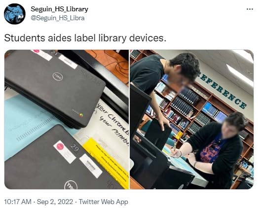 Students at Seguin High School labeling student Chromebooks with stickered numbers.