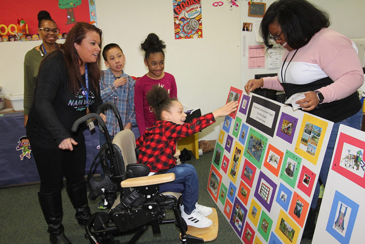 Students at Beckham Elementary select the playground equipment options they like best