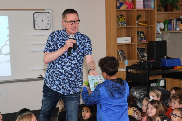 Duff Elementary's new library gets a visit from author John Schu who inspires students to read