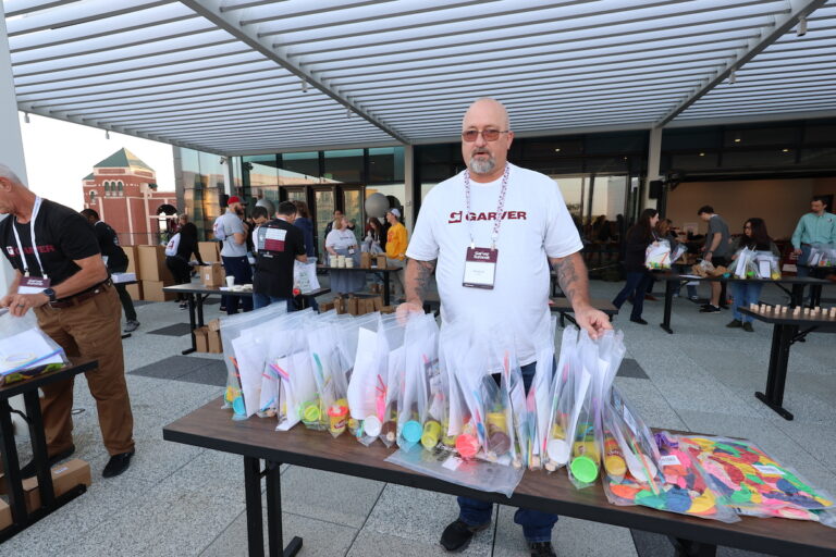 STEM kits for Pearcy STEM Academy students donated by Garver along with $5,000