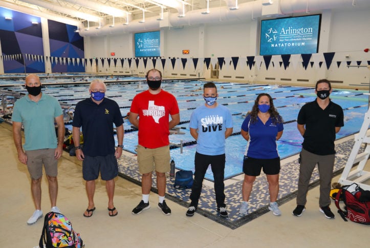 AISD swim coaches in new natatorium