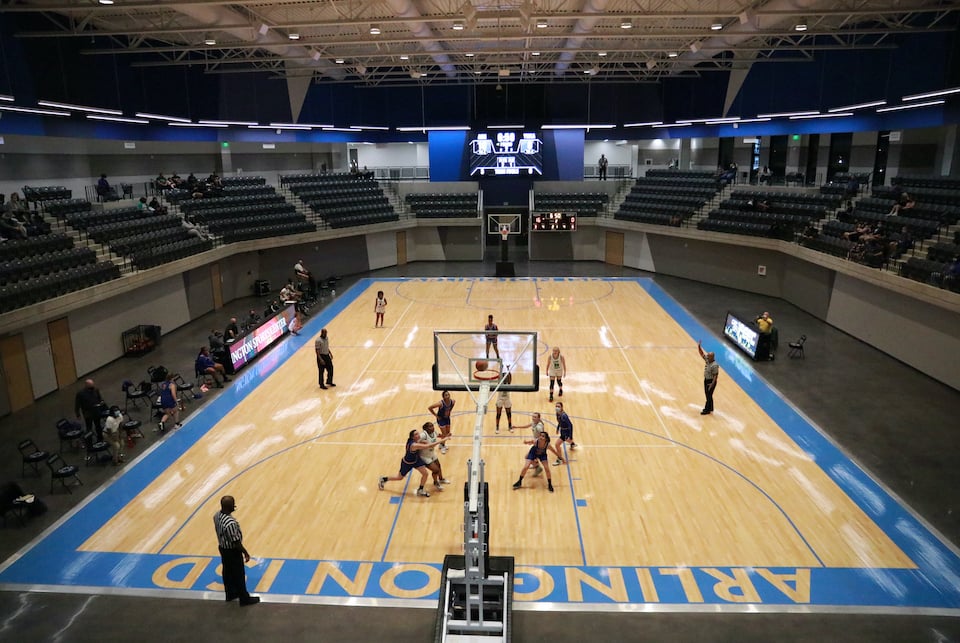 Arlington High School girls basketball team plays in first game at the new Arlington ISD arena