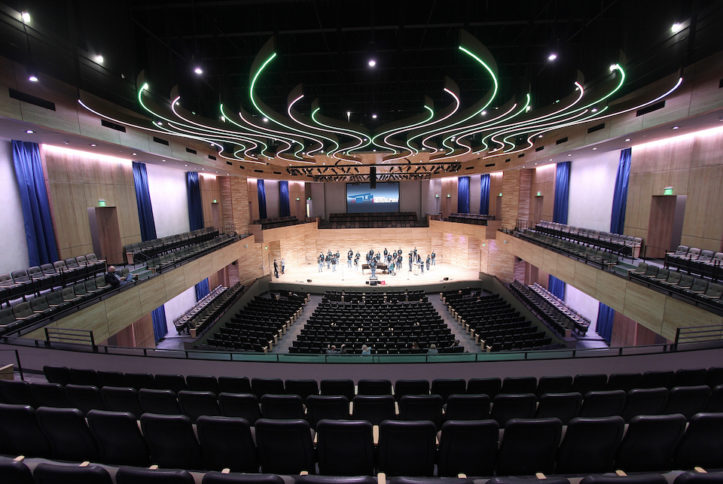 Concert hall in the Arlington ISD Center for Visual and Performing Arts - Arlington High School men's choir rehearses for concert
