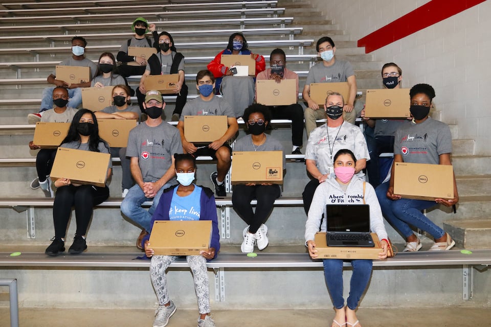 Matthew McConaughey's just keep livin Foundation Donates Laptops to Sam Houston High School students