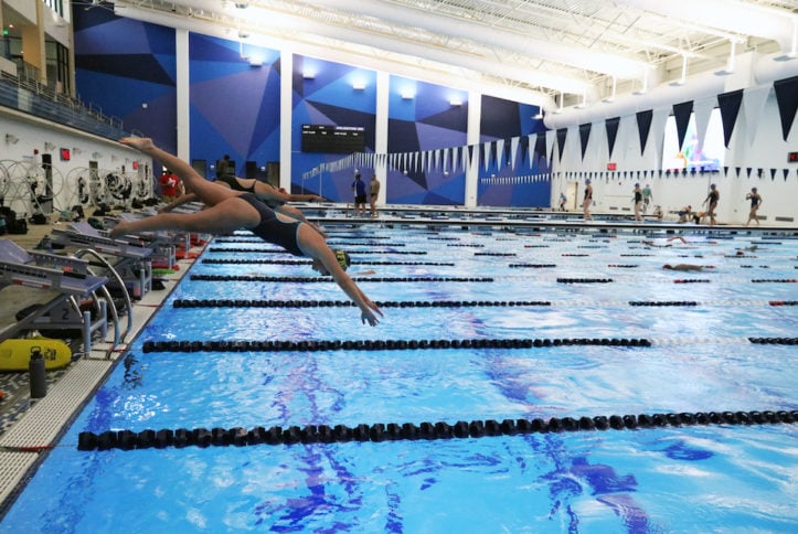 Diving in pool at new natatorium, which will host new Arlington ISD Aquatics Club - first district swim meet at natatorium will be livestreamed